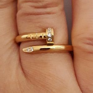 Gold Nail Clove Zirconia Ring